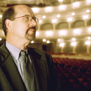 Don Fearing ('77 BS) and view of the Bass Performance Hall from the stage.