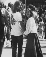 1974 photo of two students in a crowd