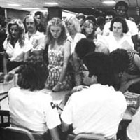 1980 photo of students waiting in line