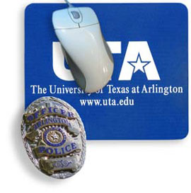 computer mouse and pad with police badge