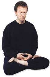 Professor Arthur Reyes in a meditative pose