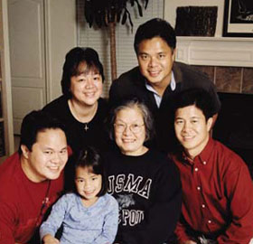 Anita Reyes with granddaughter Nina, son Paul, daughter-in-law Carla, son Ron and son Art.