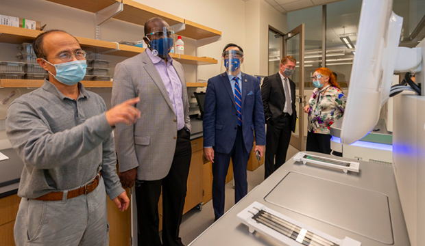 University of Texas System Executive Vice Chancellor for Academic Affairs Archie Holmes Jr., second from left, visited the UT Arlington campus on Oct. 27.