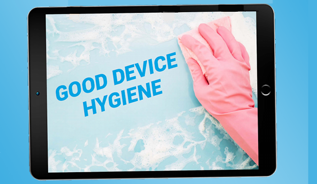 Digital device hygiene article shows a gloved hand wiping down a tablet with a soapy sponge.