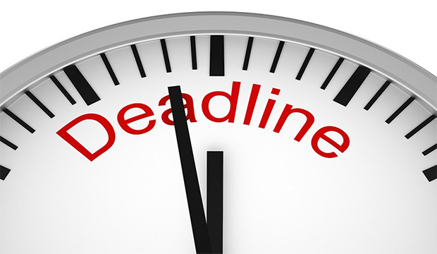 Clock hands just before midnight with word "DEADLINE"