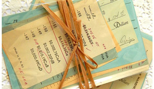 vintage receipts tied together with twine