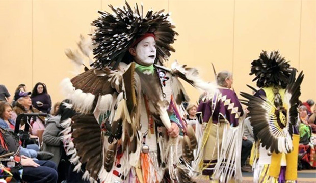 Native American in powwow regalia