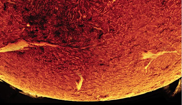 close image of sun and solar flare
