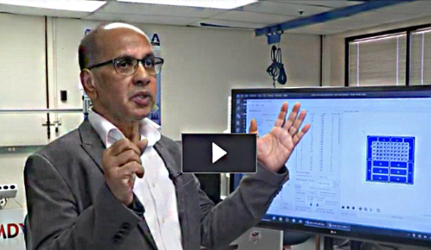 Muthu Wijesundara of UTA Research Institute uses hand gestures to show how a robotic healing glove can help stroke patients.