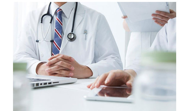 Telemed--doctor and nurse with documents