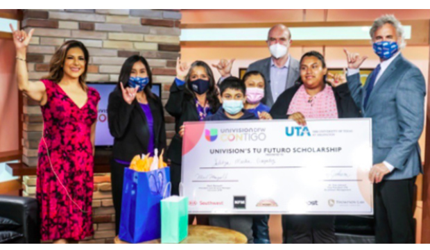 Group of people for UTA/Univision scholarship presentation.