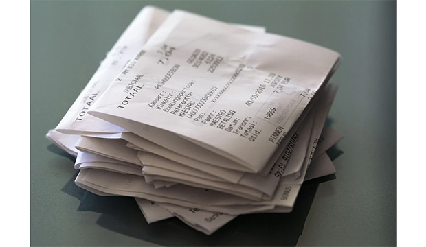 pile of printed receipts