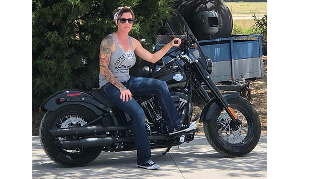 Jodie Wofford sitting on a motorcycle