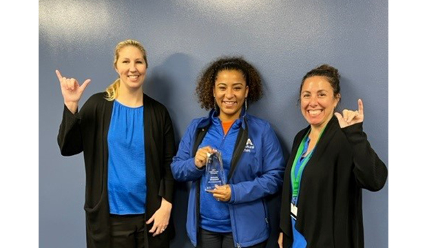 Melanie Shepard, center