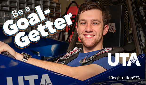 Young man sitting in SAE Formula race car with text "Be a Goal-Getter"
