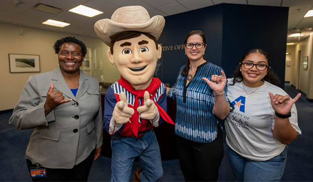 From left, Provost Tamara Brown, President Jennifer Cowley and Julianna Serrano with Little Big Tex.