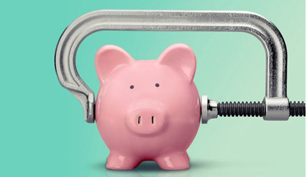 Piggybank with metal vise on it