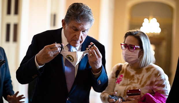 Senate Energy and Natural Resources Chair Joe Manchin (D-W.Va.) and Sen. Kyrsten Sinema (D-Ariz.) at the Capitol