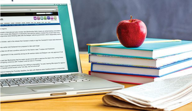 apple on textbook by compuer