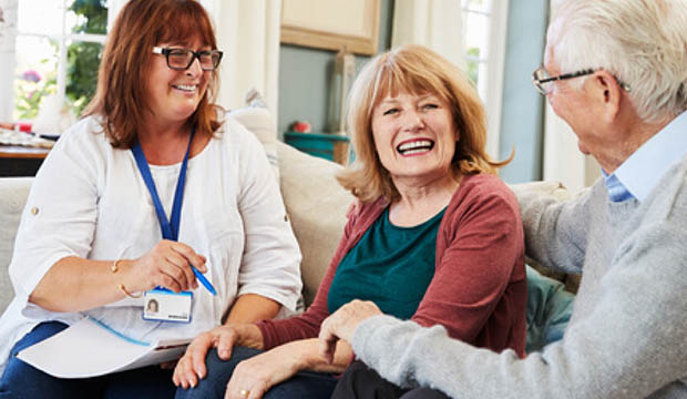 Social Worker with an older couple