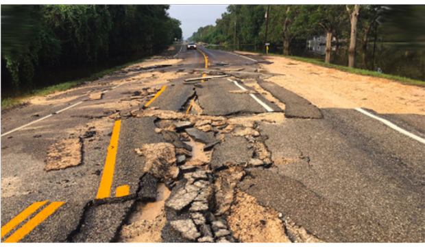 highway section damaged by flooding.
