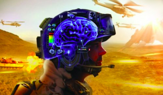 Soldier in battlefield wearing a "smart" helmet that monitors his brain.