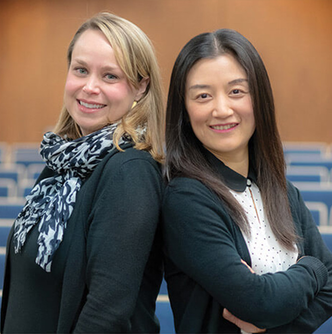 Noelle Fields and Ling Xu, social work associate professors