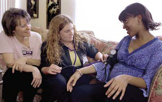 nursing students with expectant mother