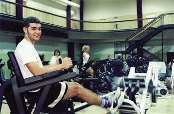 Freshman Daniel Phillips working out in the Activities Building