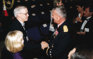 College of Engineering honoree Robert C. Davis greets Tommy Franks.