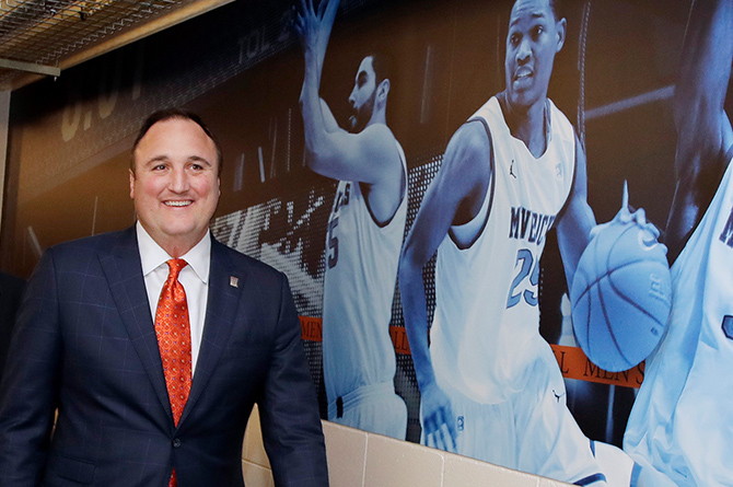 Ogden walking through College Park Center