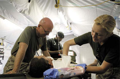 Kelly Bowman working on a mobile trauma surgical team