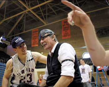 Michael Paye congratulates coach Jim Hayes