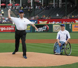 President Spaniolo throwing the first pitch