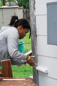 Student April Scales paints house Student April Scales paints house