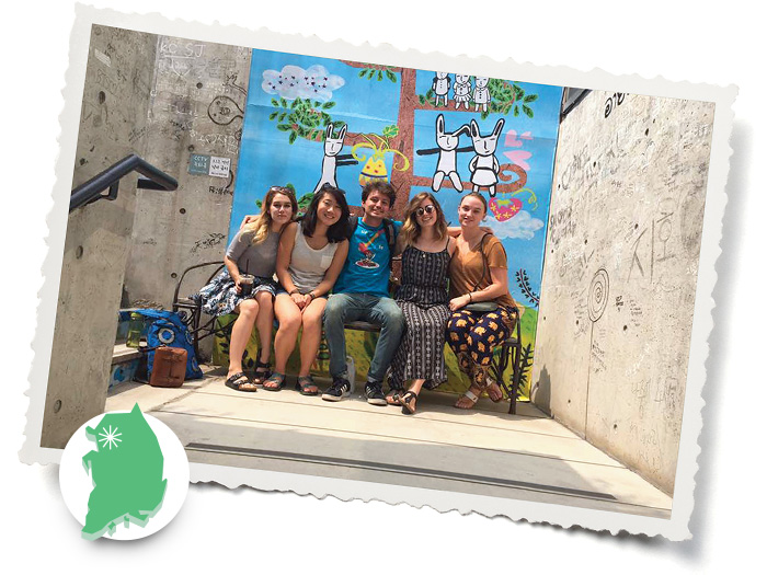 Melanie Mohler (far left) and friends stop for a photo op on the streets of Seoul.