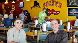 Clint Bixler (‘88), left, and Eddie White (‘91) own two Fuzzy’s Taco Shop locations.
