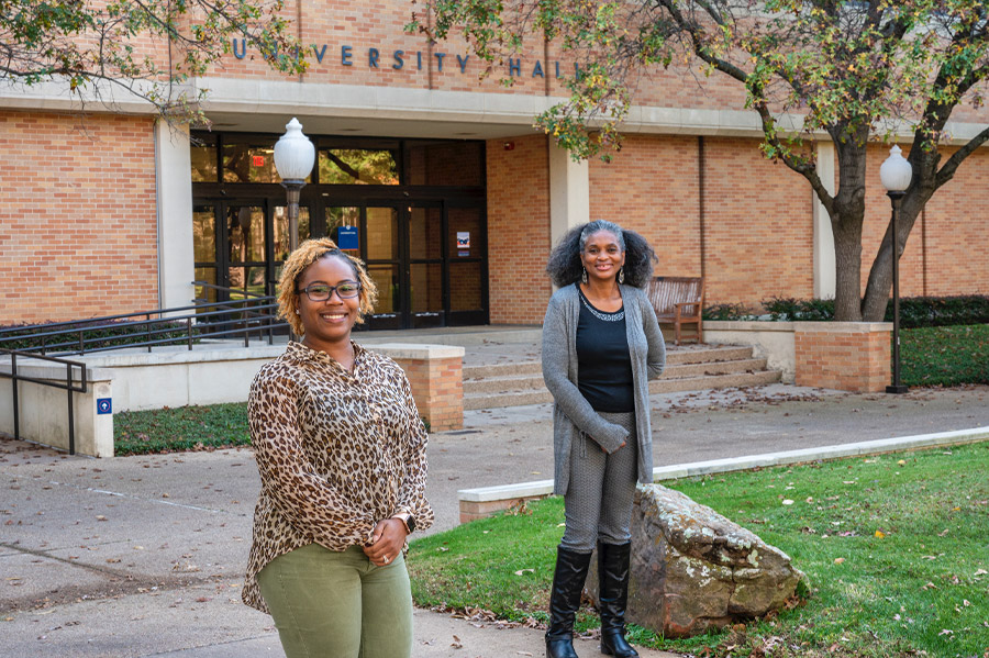 Tiffani Riddick (left) stands with Elvira Smith outside of University Hall.