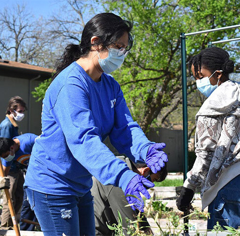 UTA students helping clean up