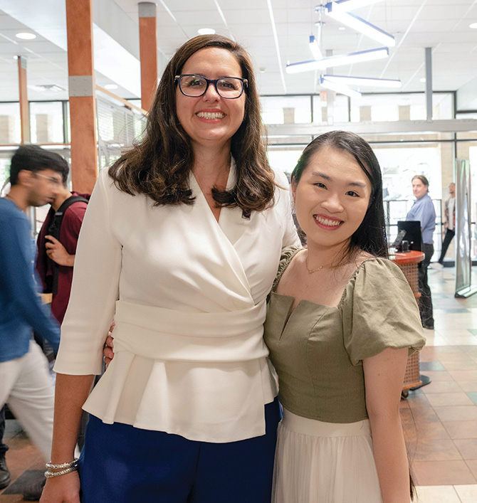 President Cowley and student body President Teresa Nguyen, a linguistics and psychology major.