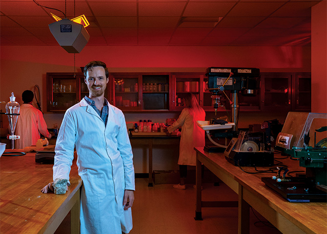 Photo of Dr. Nathan Brown and the Dark Lab in UTA Geoscience Building